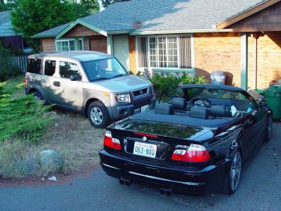 Honda Element and BMW M3... two polar cars