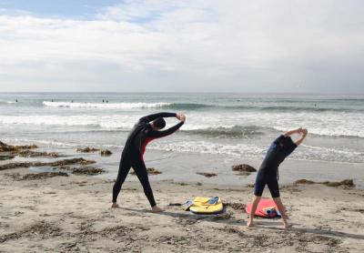 Stretching before Boogy Boarding
