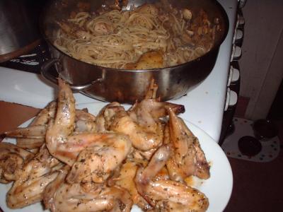 chicken wings with mushroom sauce and linguine
