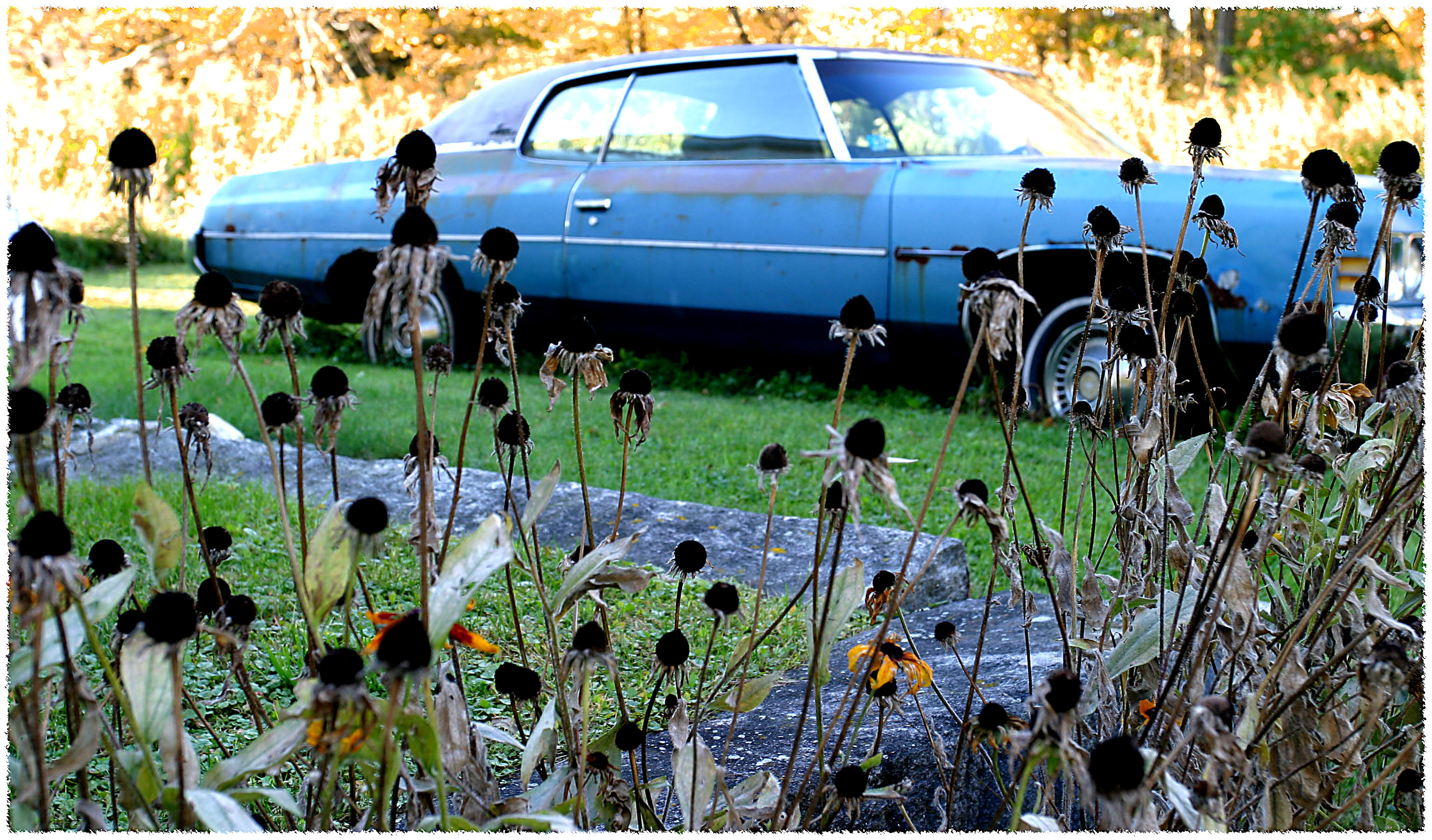 Old blue car near the church