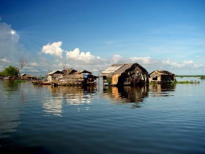 Boathouses in Tonle Sap River, Cambodia by Alec Ee