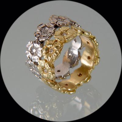 Yellow and white gold rings by Avi Shachar