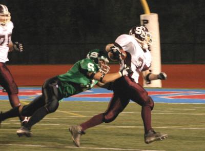 Jeff Strong tackling Arron Zurn