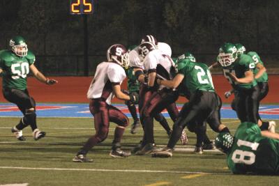 Ryan Poklemba tackling Arron Zurn