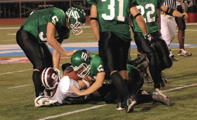 Ryan Poklemba tackling Pat Simonds