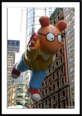 Arthur, star of animated television programs, wafts through the streets of Broadway.
