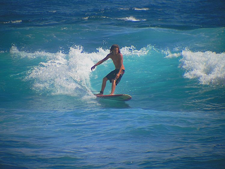 Surfing at Issac Hale Beach Park