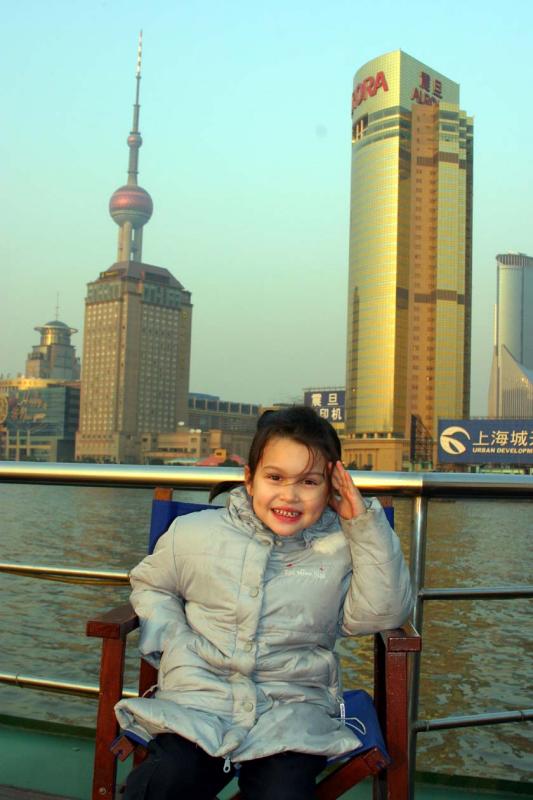 On the Ferry with the Pearl Tower in the Background