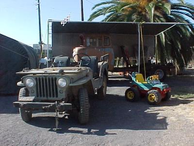 1947 Jeep CJ-2A, 1957 Jeep FC-170 pickup and Jacob's electric Jeep, still have them all.