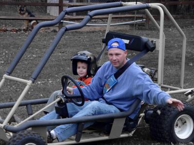 My Brother JD and his oldest son (MY Nephew) Josh. We went to my Cousin's Stacy's house to ride this go-cart. It was a blast.