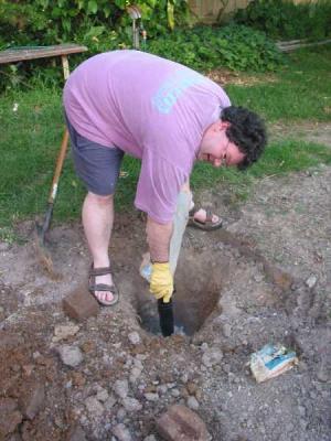 installing the new clothesline hole-in-the-ground
