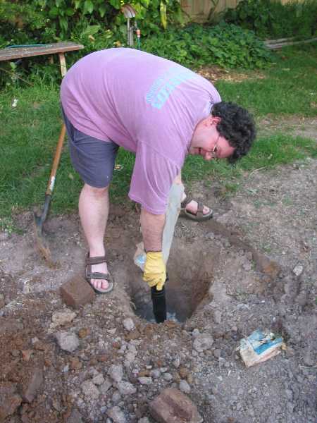 installing the new clothesline hole-in-the-ground