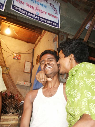 Being friendly at the Chicken Market, Dhaka