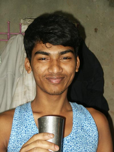 Boy with cup, Market, Dhaka