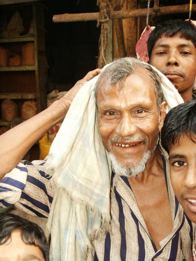 Old man with towel, Bangladesh