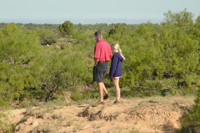 Father and daughter enjoying the scenery