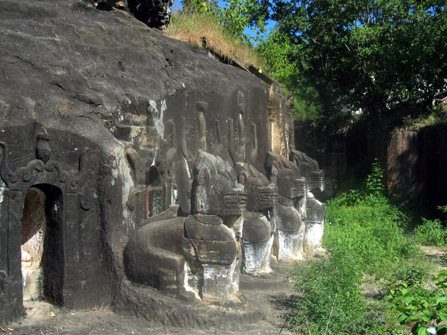 Elephants in stone guard the entrance.