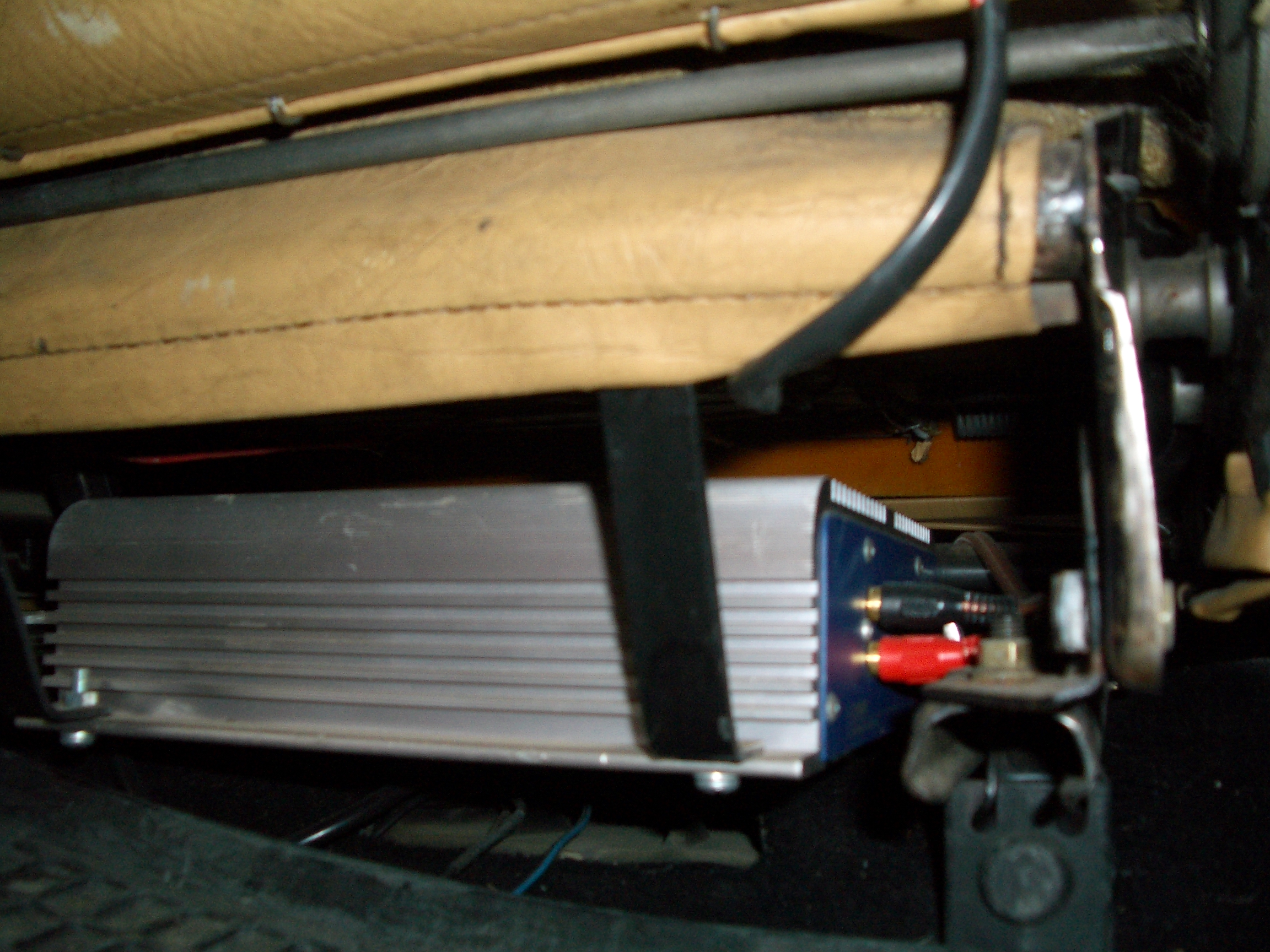 Amp under seat.JPG