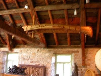 birch bark canoe in rafter of McKenzie's studio