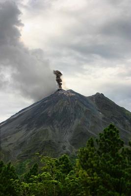 An eruption plume from the Arenal Observatory lodge