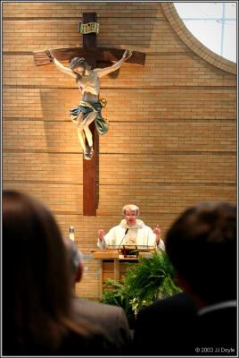 Father Tim at mass-PC.jpg