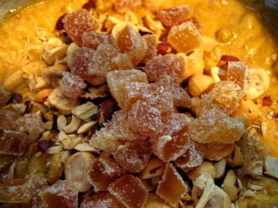 Fold in hazelnuts, raisins & candied ginger