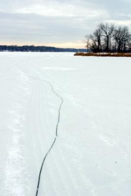 This is the path leading to the fishing spot.  The ice makes loud cracking sounds which gives one the impression that it isn't safe to walk on.