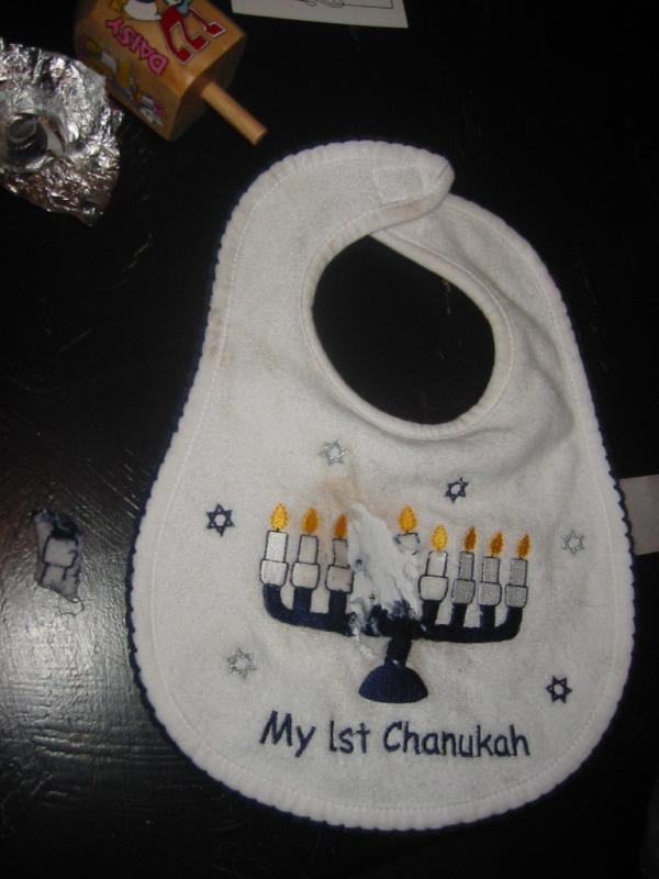 Danny (most likely) or Rocket ate the bib
