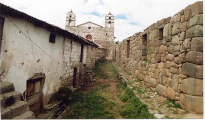 Inca wall vs modern village structures
