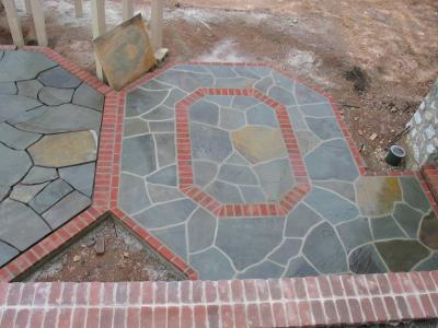 irregular bluestone with brick header edge