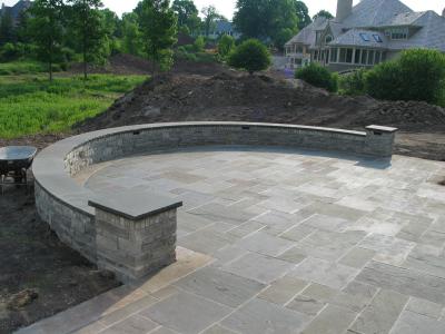curved lannon stone wall , A-pattern bluestone patio