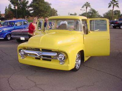 yellow Ford pickup truck