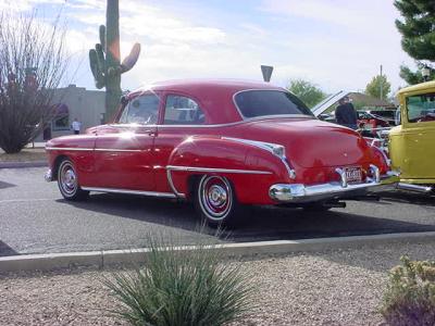 beautiful red 1950 Oldsmobile