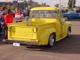 yellow Ford pickup truck