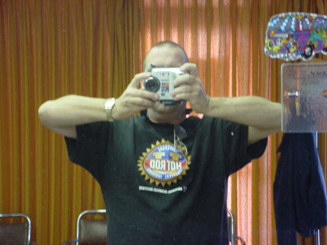 Jeffrey Lewis taking<br> a photo of self