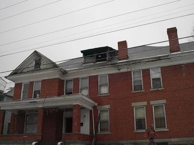 Left side of damaged house.