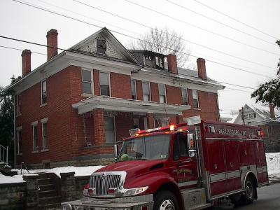 Left side of damaged house.