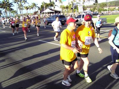 Blind runner and friend helping each other