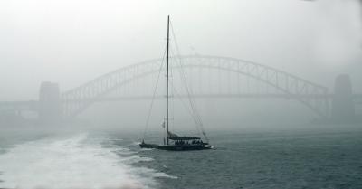 Yacht in storm on Sydney Harbour