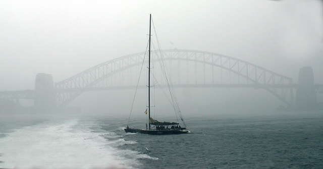 Yacht in storm on Sydney Harbour