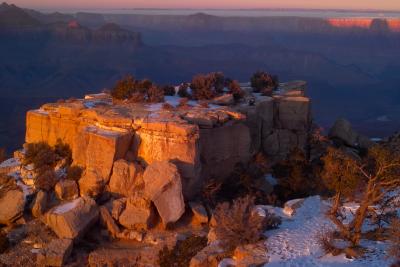 the edge of grand canyon at sunset