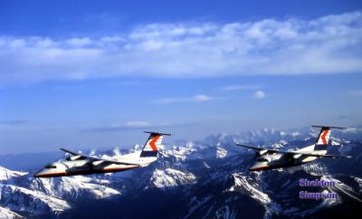 Dash 8 Over Mountains