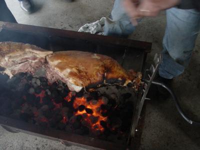 Roasting the legs of the pig.