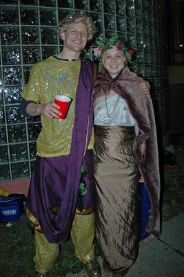 The Toga Krewe attends the Bacchus Parade