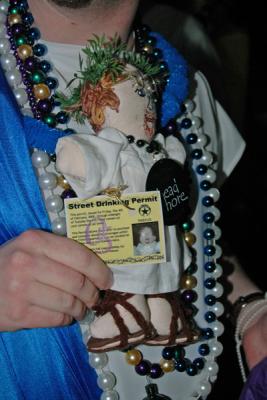 The Toga Krewe attends the Bacchus Parade