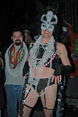 The Toga Krewe attends the Bacchus Parade