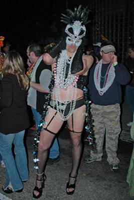 The Toga Krewe attends the Bacchus Parade