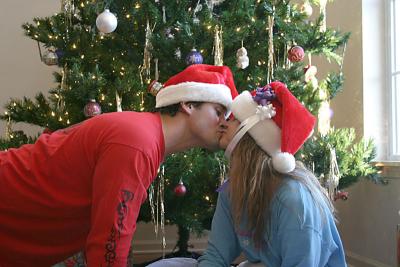 Mommy-kissing-Santa-Claus.jpg