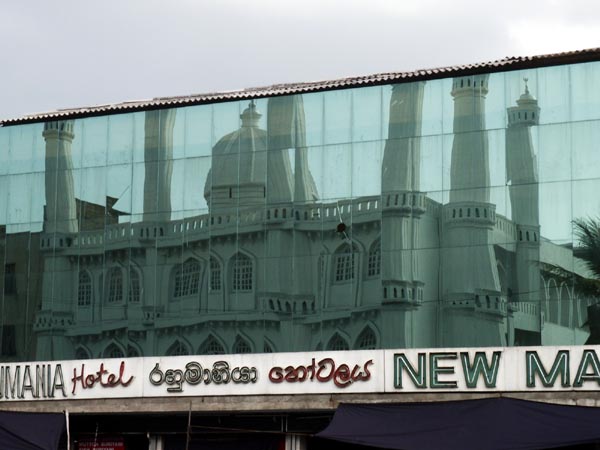 New and old - reflection of the Dewata-gaha Mosque 