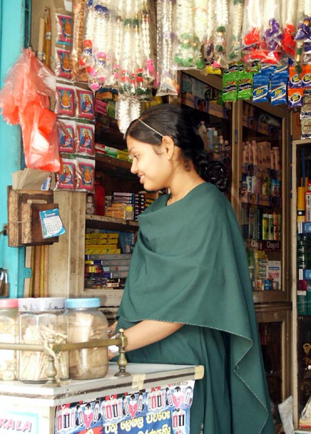 Girl working in a shop, Negombo